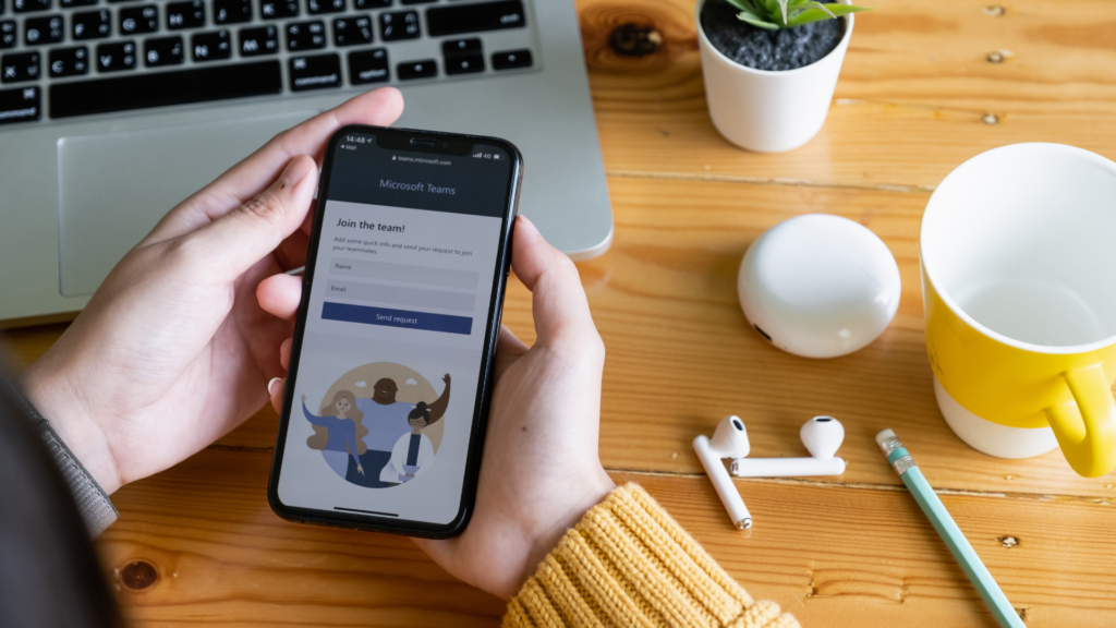 image of someone holdng a mobile phone with the Microsoft Teams Security app