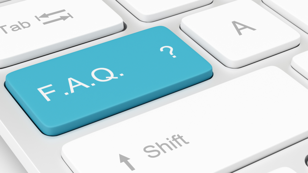 image of a keyboard where the caps lock has been replaced with a blue FAQ's key