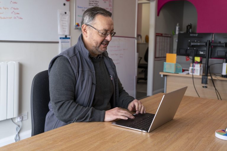 technician looking at his IT support screen